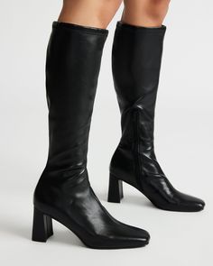 A half-zipper closure gives the HOLLY knee boot a calf-defining fit while an angled block heel and a square toe giving this style a sharp finish. Square toe block heel knee boot Side half zipper closure Angled block heel 2.75 inch heel height Size 6 measurements: 12 inch shaft circumference, 14.25 inch shaft height Size 8 measurements: 14.5 inch shaft circumference, 15.5 inch shaft circumference Size 10 measurements: 15 inch shaft circumference, 16 inch shaft height Vegan leather upper material Kitten Heel Slingbacks, Long Black Boots, Steve Madden Store, Wedge Loafers, Holly Black, Exclusive Shoes, Leather Socks, Knee Boot, Black Knees