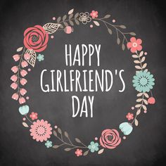 a chalkboard with the words happy girlfriend's day written in white and pink flowers