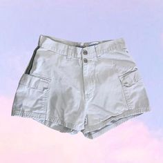 Vintage 90s y2k cargo shorts. Fits like an xs. By gasoline in the late 90s early 2000s y2k era. Fits 23-24" waist. Perfect condition!  24" waist  9.5" rise  36" hip  2" inseam Utility Jean Shorts With Cargo Pockets For Streetwear, Trendy Streetwear Cargo Shorts With Pockets, Spring Streetwear Short Length Cargo Pants, Y2k Style Summer Cargo Pants With Pockets, Short Length Cargo Pants For Spring Streetwear, Summer Jean Shorts With Multiple Pockets, Y2k Style Bottoms With Cargo Pockets, High Waist Casual Cargo Shorts With Multiple Pockets, Trendy Cotton Shorts With Multiple Pockets