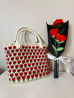 free shipping on orders over $39 for a hand-crocheted tulip tote bag, which is hand-washable and air-dryable. I will be traveling and will not send packages until September 1, 2024. Cute Handmade Square Crochet Bag, Cute Everyday Crochet Rectangular Bag, Handmade Square Crochet Bag For Gift, Handmade Crochet Tote Bag For Crafting, Cute Everyday Crochet Tote Bag, Cute Handmade Crochet Bag For Everyday Use, Cute Rectangular Crochet Bag For Gift, Cute Rectangular Crochet Bag For Gifts, Crochet Tote Bag For Gift