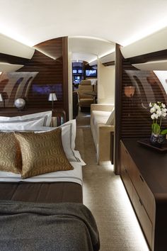 the interior of a luxury yacht bedroom