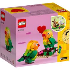 the box is full of legos and has an image of two birds on it