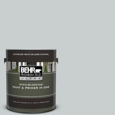 a gallon of behr premium plus ultra stain - blocking paint and primer in one