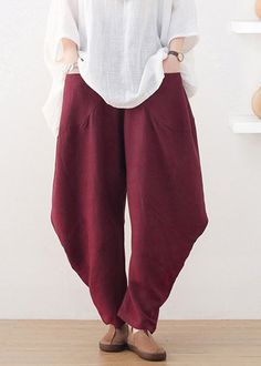 Plus Size Wine Red Pockets Wide Leg Pants FallFabric: Cotton 45%, Linen 55%Size & Fit: This garment fits true to size.Length: Size 3XL measures 37.83"from waist to hem.Waist:Fitted - elastic waist allows stretch Hip: Loosely Fitted. room for hips. Hand Wash Cold. Red Wide Leg Harem Pants With Pockets, Red Wide-leg Summer Harem Pants, Red Wide-leg Harem Pants With Pockets, Red Cotton Full-length Harem Pants, Red Relaxed Fit Full-length Pants, Red Pocket, Fall Fabric, Wine Red, Harem Pants