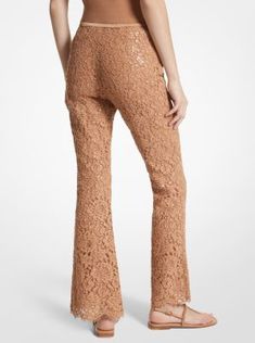 These lace bootleg pants glisten thanks to allover hand-embroidered sequins, which highlight the floral pattern. Cropped, scalloped hems allow for easy styling with heels and sandals alike. Made in Italy. Lace Flare Pants For Party, Lace Flare Bottoms For Party, Flare Lace Bottoms For Party, Embellished Pants For Fall, Fitted Embellished Pants For Fall, Spring Evening Lace Bottoms, Elegant Fitted Bottoms With Lace Work, Elegant Full-length Lace Bottoms, Elegant Full Length Lace Bottoms