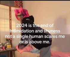 a person in a room with a stuffed animal on their head and the caption reads, 202 is the end of intimitation and shyness not a single human scaries me or is above me