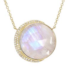 Be bold and unique with this stunning larger size moon phase necklace. Featuring a truly breathtaking 16mm diameter center stone, cut in-house from all-natural materials, and nestled into a custom-made gold setting with natural, conflict-free diamonds, this gorgeous necklace is sure to become the centerpiece of your jewelry collection. Rainbow moonstone, a feminine stone with relaxing energy, is a great choice for this bold contemporary style. We use all-natural stones in each and every piece we Luxury Moon Shaped Necklace, Elegant Round Crystal Necklace With Moon Charm, Moonstone Crystal Necklace With Moon Phase, Luxury Round Moonstone Jewelry, Elegant Moon Phase Crystal Pendant Necklace, Celestial Gemstone Round Pendant Necklace, Luxury Moonstone Necklace With Gemstones, Moonstone Necklaces With Gemstone Accents, Round Moonstone Necklace With Gemstone Accents