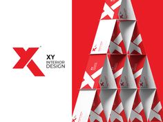 the xy interior design christmas tree is shown in red and white, with an abstract pattern