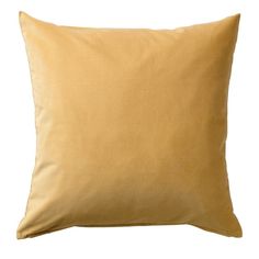 a yellow pillow on a white background