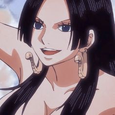 an animated image of a woman with long hair and big earrings on her chest, posing for the camera