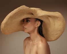 Crochet Glamour Hat 100% Toquilla straw. This natural fiber is known for its quality and beauty. The perfect beach-to-city accessory. Each hat takes approximately two to three days to weave by hand by our Ecuadorian artisans, and after pressed for shape. Indulge in luxury with our Crochet Glamour Hat. Made from high-quality toquilla straw, this hat is not only perfect for the beach, but also adds a touch of elegance to any city look. A must-have accessory for the fashion-forward. -We ship with D Chic Natural Crochet Hat For Beach, Chic Natural Crochet Beach Hat, Chic Crochet Hat For Beach In Natural Color, Chic Natural Color Palm Leaf Hat, Natural Handwoven Hat For Kentucky Derby, Handwoven Natural Hat For Kentucky Derby, Chic Handwoven Brimmed Straw Hat, Chic Handwoven Natural Hat, Chic Natural Color Handwoven Hat