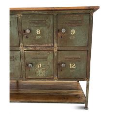 an old green metal cabinet with numbers on the front and bottom drawers, sitting against a white background