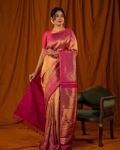 Featuring the stunning gold and Rani pink Tissue and Silk 8 Kol or Ettu Kol Kanjivaram silk saree, with gold tissue plain body and Rani pink seepu rekku border and opulent rich pallu. The craftsmanship of this saree lies in its meticulous weave, where zari and silk are woven together using a distinctive technique that highlights the seamless interplay between the silk and zari. Saree code: CL8K3139 #cliosilks #indianhandloom #weavesoftamilnadu #silksarees #iwearhandloom #kanchipattu #saree... Zari Saree, Rani Pink, Kanjivaram Silk Saree, Tissue Saree, Tamil Nadu, Silk Saree, Silk Sarees, Weaving, Highlights