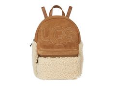 UGG Dannie II Mini Backpack Sheepskin - Handbags : Chestnut : A plush new style to elevate your commuter style, the leather UGG Dannie II Mini Backpack Sheepskin featuring a top carrying handle and dual adjustable shoulder straps. Zip closure and exterior front zip pocket and quilted signature logo detail. Textile lining. Imported. Real dyed fur from sheep. Fur origin: Australia. Measurements: Bottom Width: 8 in Depth: 3 in Height: 11 in Strap Length: 36 in Strap Drop: 18 in Handle Length: 6 in Quilted Leather Backpack For Everyday Use, Commuter Style, Back Bag, Mini Backpack, Signature Logo, New Style, Chestnut, Shoulder Straps, Fashion Backpack