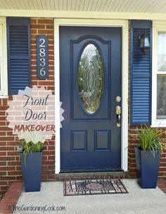 a blue front door with a glass window