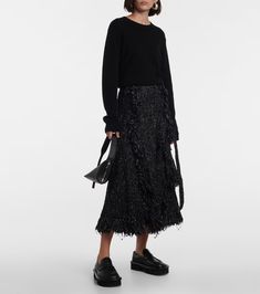 Fringed flared tweed midi skirt in black - Sacai | Mytheresa Chic Wool Mini Skirt, Chic Wool Skirt For Winter, Chic Winter Wool Skirt, Chic Wool Flared Skirt, Chic Wool Midi Skirt, Spring Wool Midi Skirt, Chic Flowy Wool Skirt, Wool Long Skirt For Spring, Long Wool Skirt For Spring