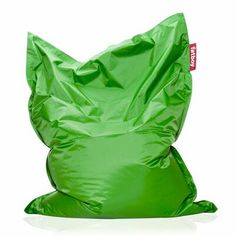 a green bean bag sitting on top of a white floor