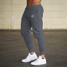 Fabric:Polyester; Gender:Men's; Style:Athleisure; Occasion:Sports Outdoor; Fit Type:Regular Fit; Waistline:Mid Waist; Pattern:Geometric Pattern; Design:Elastic Waist,Drawstring; Pants Type:Track Pants,Trousers,Sweatpants,Joggers,Joggers; Front page:FF; Listing Date:03/01/2022; Hips:; Length:; Waist:; Fit US Size:null; Fit UK Size:null; Fit EU Size:null Sportswear Joggers, Jogging Pants Men, Mens Running Pants, Workout Sweatpants, Celana Fashion, Bodybuilding Clothing, Gym Workouts For Men, Pants Jogger, Sports Sweatpants