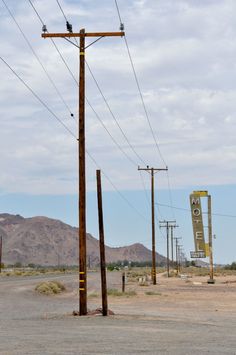 power lines and telephone poles in the desert