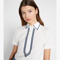 A classic polo is reimagined with a '70s influence. Crafted in lightweight mercerized cotton, the collared top is designed for wearing on and off the green. Club Skirts, Collared Top, Designer Tops, Twill Pants, Slim Straight Jeans, Cotton Polo, Retro Chic, Retro Look, Golf Shirts