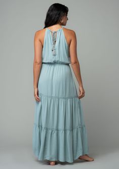 Dressed up or down, this classic bohemian maxi dress is giving Greek goddess vibes! Designed in a soft linen blend and featuring a floral embroidered top, halter neckline, and ultra-flowy tiered maxi skirt. Choose from timeless off-white or dreamy light blue color. No matter how you wear this stunning bohemian maxi, you'll turn heads everytime! Linen blend Embroidered Relaxed fit Sleeveless Maxi length Tiered skirt Adjustable halter neckline with tassel ties Back keyhole detail Elastic waist Lin Bohemian Linen Maxi Dress For Brunch, Bohemian Linen Maxi Dress, Goddess Vibes, Boho Maxi Dresses, Bohemian Maxi, Floral Embroidered Top, Tiered Maxi Skirt, Bohemian Maxi Dress, Embroidered Maxi Dress