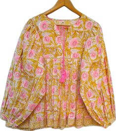 Pink Long Sleeve Cotton Blouse, Spring Floral Print Peasant Tunic Top, Spring Floral Print Tunic Peasant Top, Spring V-neck Blouse With Block Print, Feminine Cotton Long Sleeve Blouse, Bohemian Block Print Tops For Spring, Long Sleeve Floral Print Peasant Top For Spring, Fall Cotton Blouse With Tassels, Spring Cotton Blouse With Tassels