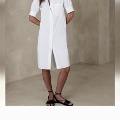 Banana Republic Women's White Button Down Dress Size Xs Knee-length Summer Shirt Dress For Daytime, Summer Daytime Knee-length Shirt Dress, Daytime Knee-length Summer Shirt Dress, White Shift Shirt Dress, Knee-length, White Shift Knee-length Shirt Dress, White Knee-length Shift Shirt Dress, White Knee-length Shirt Dress With Loose Fit, Formal Relaxed Fit Shirt Dress For Spring, Formal Summer Button-up Shirt Dress