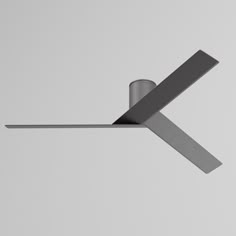 a metal object that looks like a cross on the side of a wall or ceiling