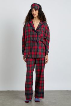 Our Antonella pyjama set in red tartan is comfortingly classic, with a contemporary twist in the bow details. • Top and bottoms • Matching storage bag included • Matching eye mask available • Button-down front • Chest pocket • Elasticated waist with functional tie • 100% organic cotton • Designed in London MODEL INFO: Model 1 is 5'10 and is wearing a UK 8. Christmas Pjs Women, Damson Madder, Cosy Vibes, London Models, 2024 Wishlist, Cotton Pjs, Cute Pajama Sets, Checked Scarf, Hooded Scarf