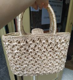 "Welcome! A beautiful vintage beige raffia handbag In good vintage condition! Measures: W: 9.24\" (24 cm) H with handles: 9.24\" (24 cm) Deep: 3.5\" (8 cm) Thanks for stopping by!!IMPORTANT: Due to the delicate situation We're all going through, and in order to keep the safety of courier workers too, all orders will be dispatched when alert sanitary finished. You can purchased or reserve items like always. Thanks so much for your understanding." Rectangular Straw Shoulder Bag For Evening, Evening Rectangular Straw Bag With Braided Handles, Elegant Beige Straw Bag With Top Carry Handle, Elegant Straw Bags With Rolled Handles, Elegant Basket Straw Bag With Rolled Handles, Beige Basket Shoulder Bag With Top Carry Handle, Beige Straw Shopping Bag With Rolled Handles, Elegant Natural Straw Bag With Top Carry Handle, Evening Straw Bag In Natural Color