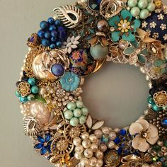 a close up of a wreath made out of jewelry