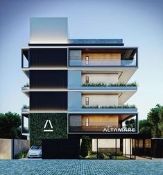 an apartment building with plants growing on the balconies