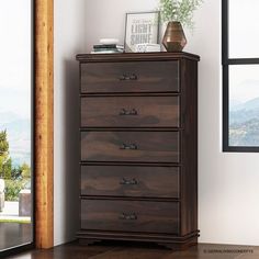 a wooden dresser sitting next to a window in a living room with a plant on top of it