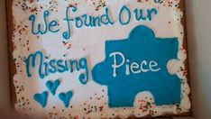 a birthday cake that says we found our missing piece