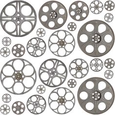 an assortment of metal reels and spoolers