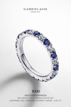 This white gold anniversary band is accented with an arrangement of sapphire and diamonds in a French pave setting. AN11359-6W44SA#GabrielNY #UniqueJewelry #EngagementRings #AnniversaryBands #EternityBand #EternityRing Luxury Blue Eternity Band For Engagement, Luxury Half Eternity Sapphire Jewelry, Luxury Open Ring Sapphire For Anniversary, Luxury Sapphire Eternity Band For Wedding, Luxury Sapphire Diamond Eternity Band, Luxury Sapphire Eternity Band For Formal Occasions, Luxury Unique Sapphire Ring For Anniversary, Luxury White Gold Sapphire Eternity Band, Eternity Band Engagement Ring Blue Nile