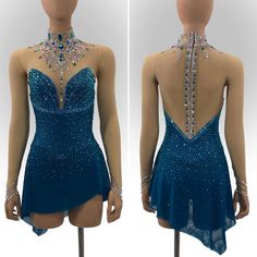 the back of a blue dress with sequins on it