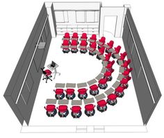 an overhead view of a conference room with red chairs