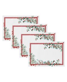 four placemats with holly and berries on white paper, one has red trim