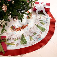 a christmas tree skirt with santa's sleigh on it