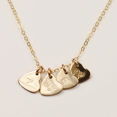 This delicate Minima heart-shaped necklace is a subtle yet bold expression of love. Minima hearts are tiny and precious, yet still make the biggest impact whenever they're worn. Wear it alone, or create your own personal necklace by stacking up with more heart charms and initials. Product Details: Material: 14k Gold Filled, Sterling silver, Rose gold filled 0.3" heart charm Production Time: Your pieces are handmade with care and love; they also take time to produce. Please allow 8- 12 business d Dainty Everyday Heart Charm Necklace, Personalized Heart Pendant Charm Necklace For Everyday, Everyday Initial Pendant Necklace With Heart Charm, Minimalist Charm Necklace With Heart Charm For Personalized Gift, Personalized Dainty Heart Pendant Charm Necklace, Minimalist Heart Charm Necklace For Personalized Gift, Minimalist Personalized Heart Pendant Charm Necklaces, Dainty Personalized Heart Pendant Charm Necklace, Personalized Heart Pendant Initial Necklace For Everyday