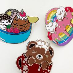 three pin badges depicting different types of ice creams and donuts in colorful bowls