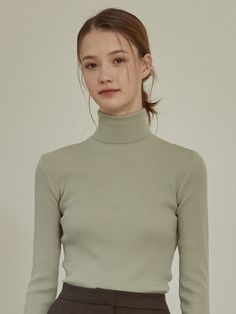 Editor's Notes This subtle turtleneck rib-knitted knit features the classic style that does not go out of seasons. The tight yet comfortable fit is ideal for layering  or stand alone with any bottom item, and will tuck neatly into your waistband. - Classic silhouette with the comfortable details allows versatile styling - Creates delicate and unique texture with it's ribbed design  - Comfortable turtleneck for warmth and styleMeasurements(in.)One Size (XS - M)- Shou Classic Ribbed Knit Top For Spring, Winter Ribbed Turtleneck Knit Top, Classic Ribbed Knit Top For Winter, Ribbed Turtleneck Knit Top For Work, Classic Ribbed Turtleneck Top, Classic Spring Turtleneck With Ribbed Collar, Classic Ribbed Collar Turtleneck For Spring, Classic Turtleneck With Ribbed Collar For Spring, Classic Winter Tops With Ribbed Neckline