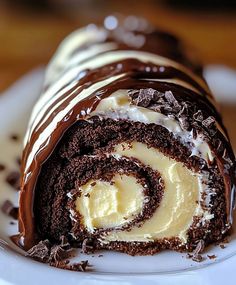 Choco Swiss Roll Delight: A Rich and Decadent Treat Chocolate Swiss Roll Recipe, Swiss Cake, Chocolate Swiss Roll, Chocolate Roll Cake, Yule Log Cake, Chocolate Ganache Cake, Swiss Roll Cake, Ganache Cake, Cake Roll Recipes