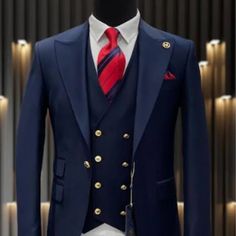 This Modern Fit Suit Features A Wide Peak Lapel, 1 Button Closures, Double Breasted Vest, Side Vents, And Matching Flat Front Pants. 100% Wool, Made In Turkey. Comes With Gold Buttons. Blue Wedding Suits With Buttons, Elegant Blue Three-piece Suit With Buttons, Elegant Blue Sets With Button Closure, Blue Double Breasted Suit With Button Closure For Semi-formal, Navy Suits With Buttons For Semi-formal Occasions, Navy Semi-formal Suit With Buttons, Blue Three-piece Suit, Fitted Blue Suit With Buttons, Semi-formal Blue Suit With Buttons