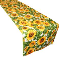 an image of a table cloth with sunflowers on the top and green leaves on the bottom