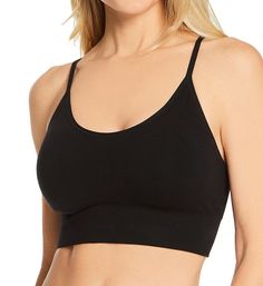 Classic, basic and sexy, this cute cropped cami bralette shows off your midriff. Made with the natural comfort of cotton, nylon, and spandex for stretch ease. Wireless, contour t-shirt cups are sewn into front, and have light padding for a smooth shape. Rounded V-shaped neckline holds in place with elastic binding at the edge. Wide, ribbed stretch fabric underband adds more height and support. Tall, seamless sides and back are lined with same fabric, with elastic binding at top and underband at Low-cut Crop Top With Built-in Bra, Low-cut Crop Top With Built-in Bra For Loungewear, Cropped Sports Bra With Built-in Bra, Solid Color Bra-friendly Low-cut Tank Top, Seamless Low-cut Crop Top For Loungewear, Trendy Seamless Crop Top Sports Bra, Seamless Solid Color Crop Top For Loungewear, Cropped Loungewear Crop Top With Built-in Bra, Seamless Camisole Crop Top For Loungewear