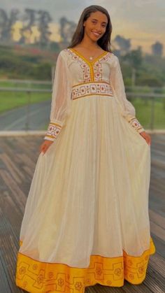 habesha kemis Ethiopian and Eritrean Habesha dress. made by keeping Ethiopia culture is a simple and elegant dress with an attractive and modern design and look. Ethiopia Culture, Simple And Elegant Dress, Modern Dress, Traditional Dress, Ethiopia, Elegant Dress