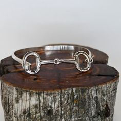 Single Snaffle Bit Bracelet view of bracelet Classic Formal Jewelry With Horse Design, Elegant Adjustable Jewelry For Shows, Classic Horseshoe Jewelry, Adjustable Sterling Silver Bracelet With Polished Finish, Adjustable Polished Sterling Silver Bracelet, Elegant Horseshoe Jewelry With Horse Design, Timeless Adjustable Sterling Silver Bracelet With Polished Finish, Elegant Horseshoe-shaped Horse Design Jewelry, Elegant Jewelry With Horse Design For Shows