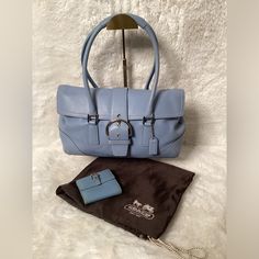 Authentic Baby Blue Coach Leather Shoulder Bag. Bag Has A Matching Wallet; Sold Separately. Bag Was Lightly Used And Is Still In Great Condition. Comes With A Dust Bag. Please See Photos For The Condition Of The Bag. Reasonable Offers Are Welcomed. Designer Light Blue Rectangular Shoulder Bag, Luxury Blue Pouch Satchel, Designer Light Blue Shoulder Bag For Daily Use, Luxury Blue Satchel With Silver-tone Hardware, Classic Blue Pouch Bag, Blue Satchel Shoulder Bag With Palladium Hardware, Blue Satchel With Palladium Hardware, Blue Rectangular Satchel With Palladium Hardware, Blue Formal Satchel With Branded Hardware